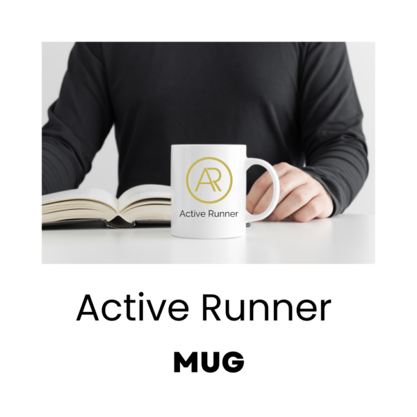 An image of a person sitting at a desk reading a book with an Active Runner Mug